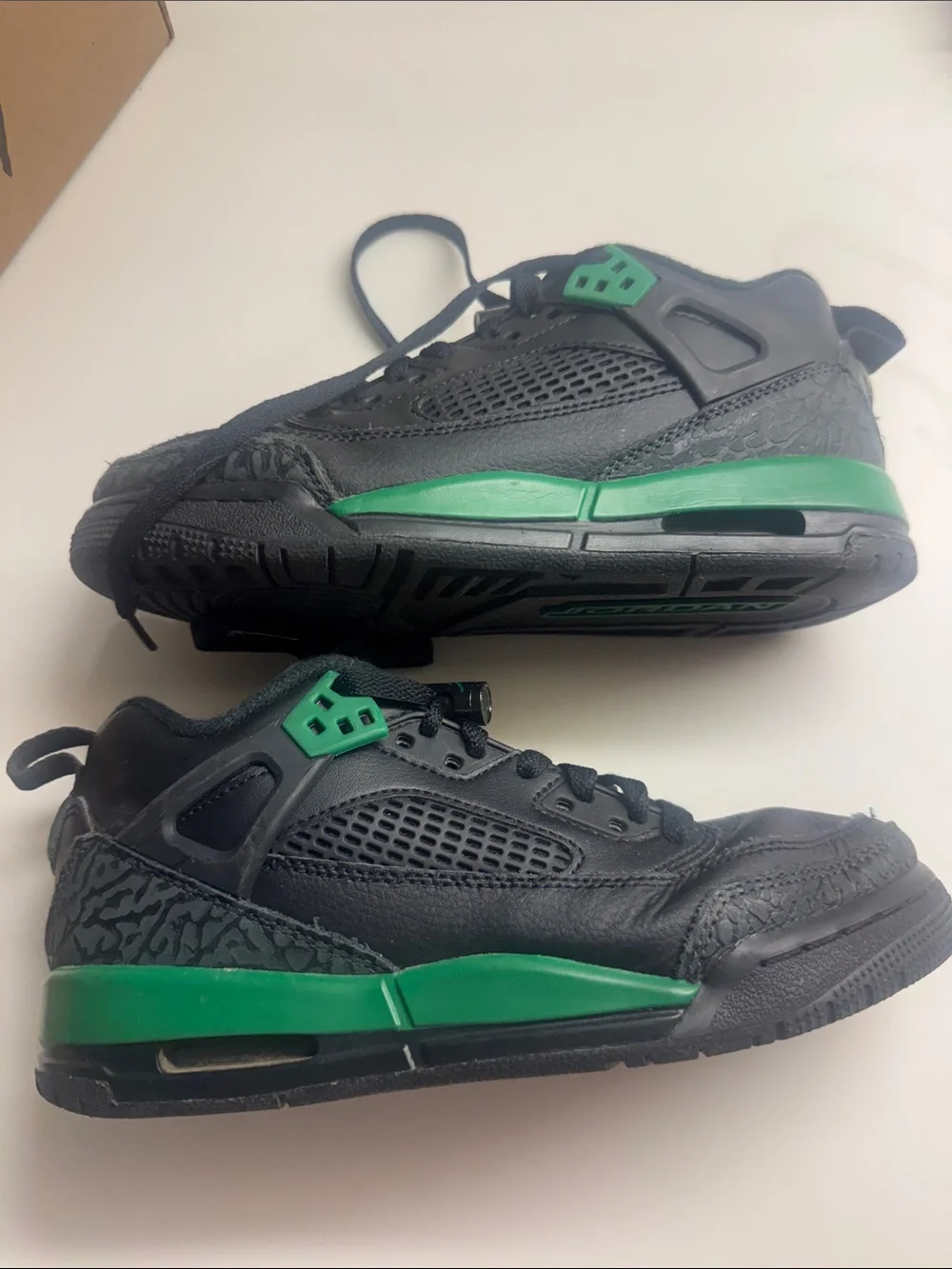 Nike Jordan’s Kids Black Sneakers with Green Accents